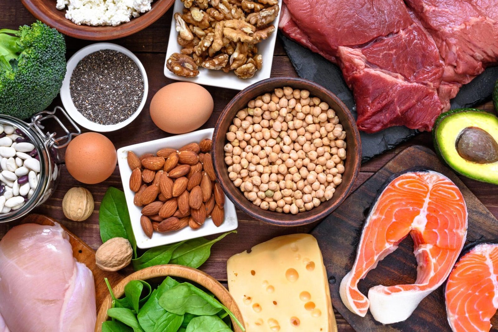 A table topped with lots of different foods.